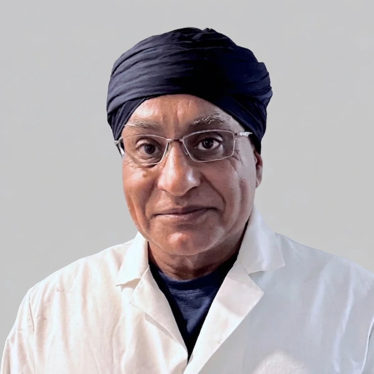 Dr. Gurpreet Singh Padda, MD, MBA, MHP, Authorized Official of CareGuard, in a dark suit against a neutral background